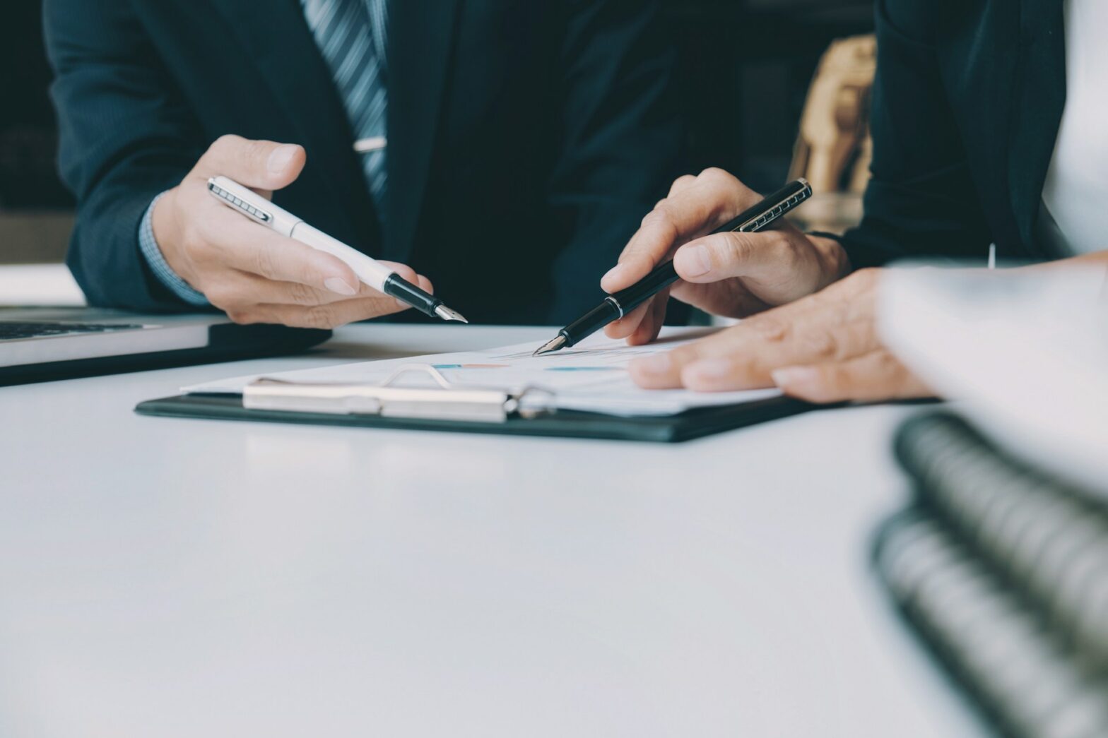 A person holding a pen